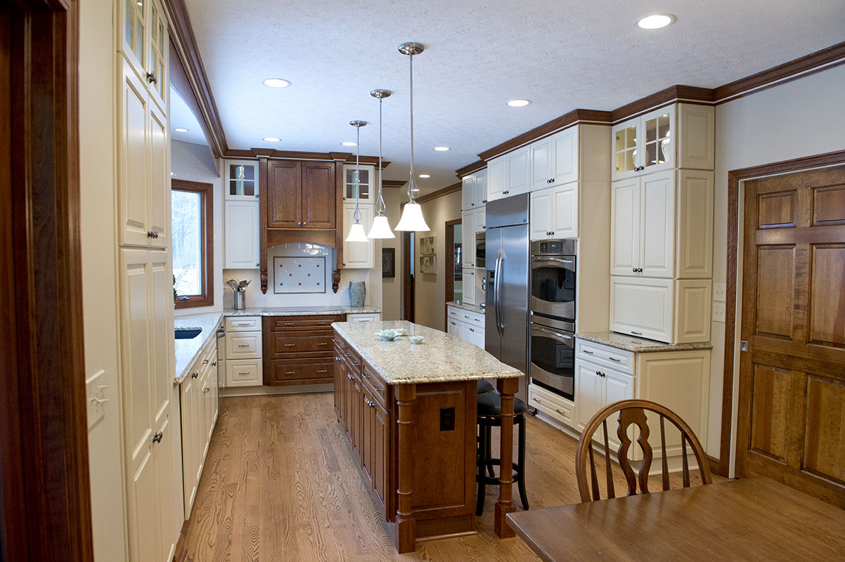 traditional-kitchen-design-custom-white-cabinets-dark-wood-center