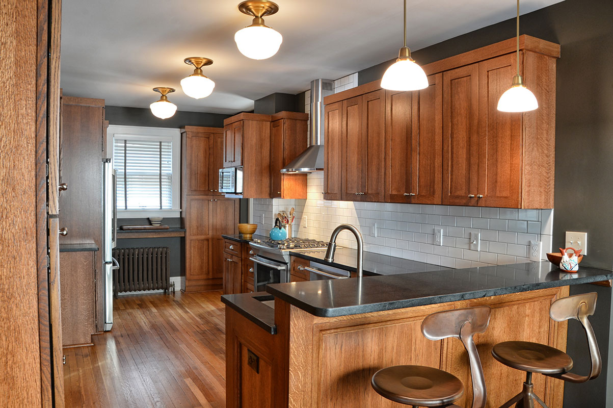 white kitchen cabinets with breakfast bar